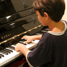 How Piano Lessons Make Your Child Smarter, Happier, and More Confident